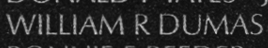 Private First Class William Richard Dumas' name inscribed on The Wall.